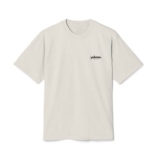 Beige t-shirt with 'yokoso' logo on a white background